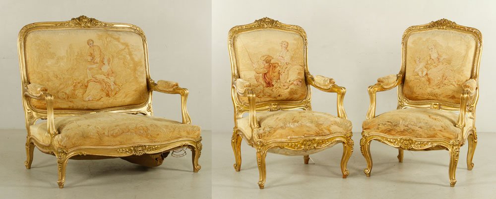 Louis XV Style Parlor Suite: Louis XV-style parlor suite, 19th century, with tapestry upholstery, to include: settee and two armchairs, 47 1/2" h x 50" l x 35" d (settee). Provenance: From a Massachusetts estate.