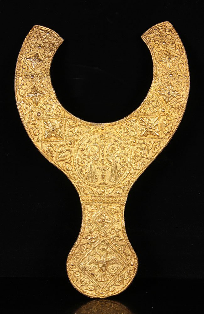 Continental Coronation Breastplate: Continental coronation breastplate, gilt copper, having ornate hand embossed designs and depicting a double-headed eagle, 19 1/4" h x 11 1/2" w.