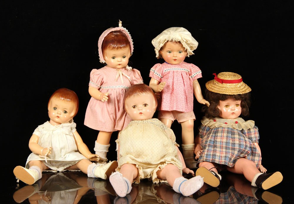 Five Effanbee Patsy Dolls: Five Effanbee Patsy dolls, to include: 21" h Patsy Lou, bent right hand, with hair, plaid dress and matching rompers, with straw hat, mark on back; 21" h Patsy Lou, bent arm, metal F&B heart bracelet,