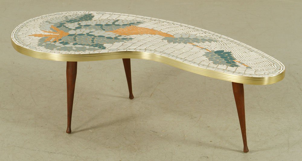 1950s Kidney Shaped Coffee Table: Kidney shaped coffee table, 1950s, with tile top, 15" h x 47" l. Provenance: From a Massachusetts estate.