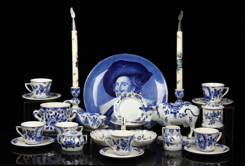 Lot of Delft Pottery: Lot of Delft pottery, to include: large charger depicting Frans Hals' "The Laughing Cavalier," 13 1/4" dia, six cups and saucers, mustard and others. Provenance: From a Massachusetts estate.