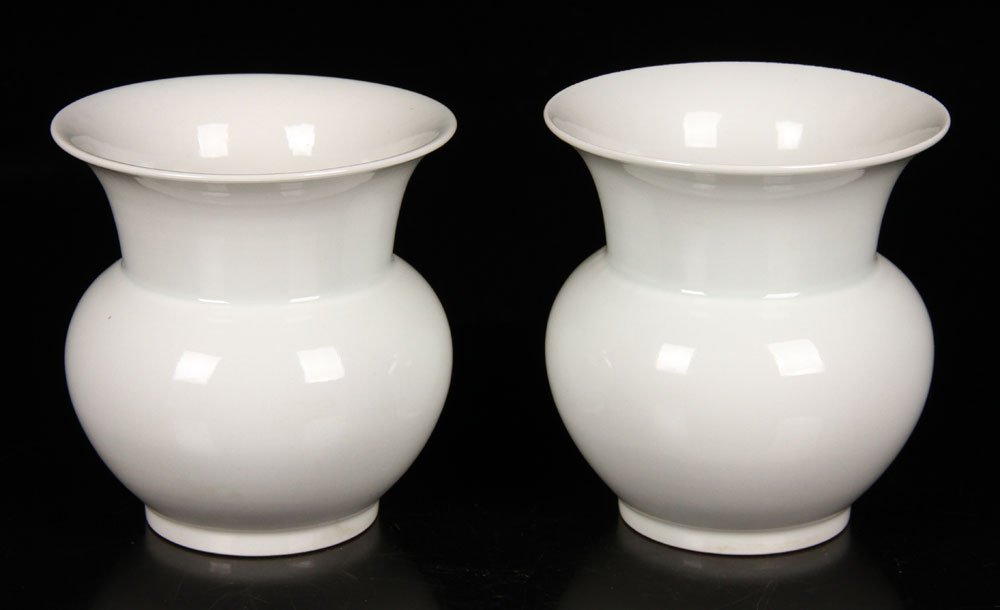 Pr. Chinese White-Glazed ‘Zha-Dou’ Vases: The vases have a rounded body and trumpeting neck with low foot ring, all covered in a milk-white glaze, underglazed cobalt-blue Zheng-De reign mark on bases, 5 1/2" h. Provenance: From a Texas collec