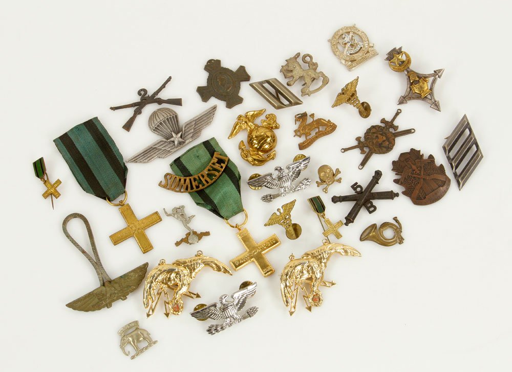 Lot of Military Insignia: Lot of military insignia, various countries. Provenance: From the estate of film, television and stage performer Raymond Kyle-Koscuik. Originally from New York, Kyle settled in West Hollywood, Califor