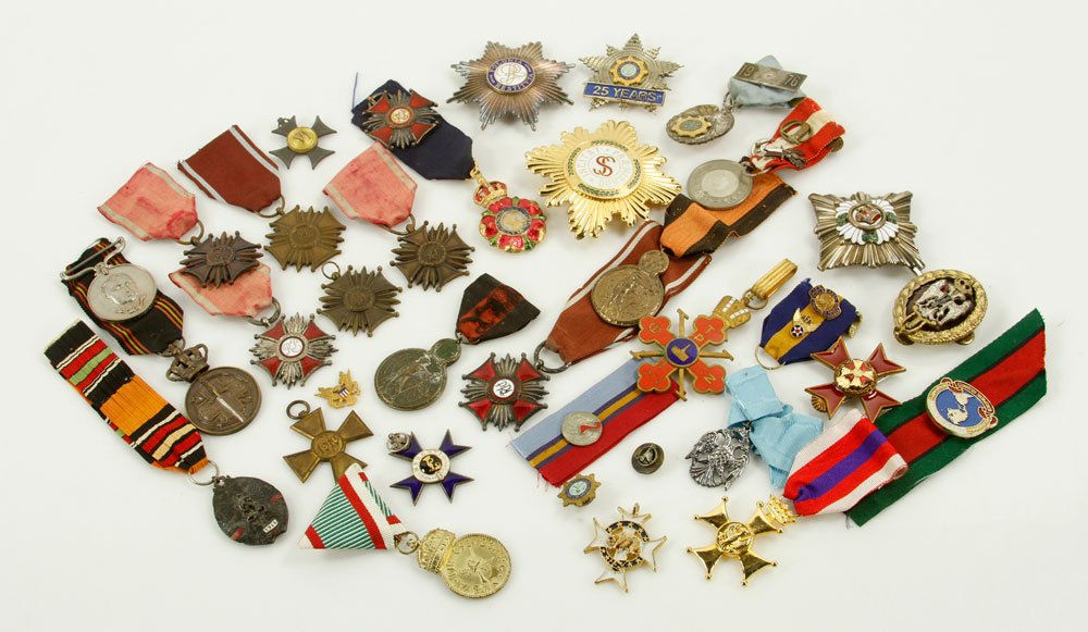 Lot of Military Badges and Medals: Lot of military medals and badges, various countries. Provenance: From the estate of film, television and stage performer Raymond Kyle-Koscuik. Originally from New York, Kyle settled in West Hollywood