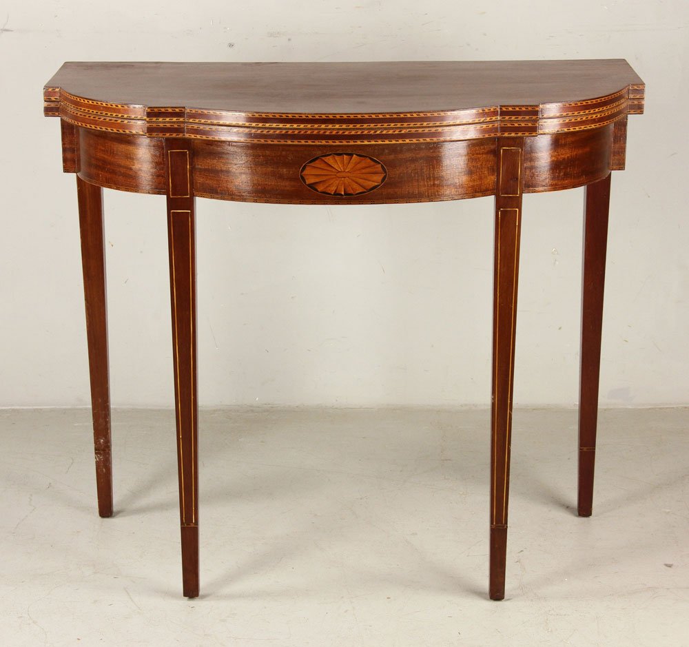 Hepplewhite Style Demilune Inlaid Table: Hepplewhite style Demilune inlaid table, mahogany, 31" h x 36" w x 18" d, top cannot open. Provenance: From a Massachusetts estate. Provenance: From a Texas collection.