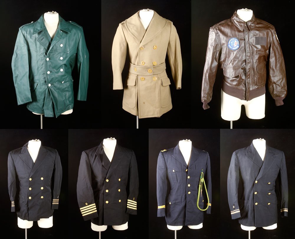 Lot of Military Coats and Pants: Lot of seven military coats and three pairs of pants (one matching a coat), with laundry bag. Provenance: From the estate of film, television and stage performer Raymond Kyle-Koscuik. Originally from