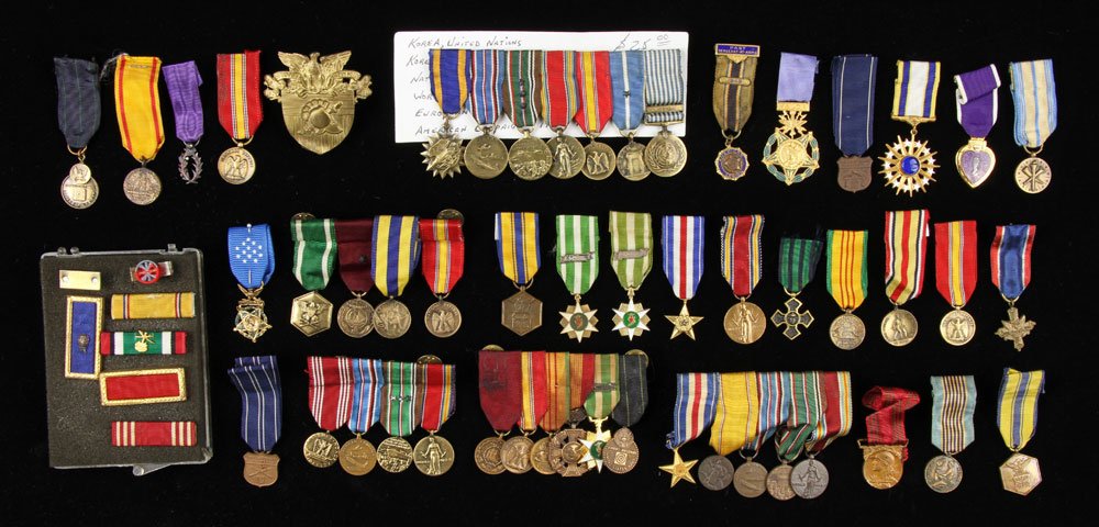 Lot of Miniature Medals: Lot of miniature military medals, to include five ribbon bars in case. Provenance: From the estate of film, television and stage performer Raymond Kyle-Koscuik. Originally from New York, Kyle settled