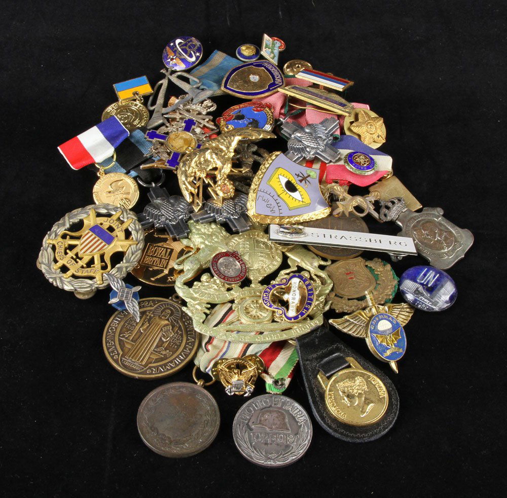 Lot of Military Medals and Insignia: Lot of military medals and insignia, various countries. Provenance: From the estate of film, television and stage performer Raymond Kyle-Koscuik. Originally from New York, Kyle settled in West Hollywo