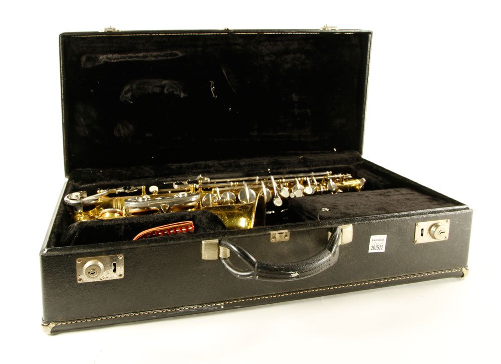 Caravelle Brass Saxophone: Caravelle saxophone, brass, with all attachments, in case, number 42240.