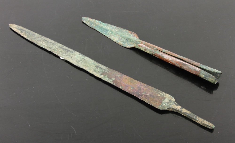Two Ancient Middle Eastern Copper Weapons: Lot of two ancient Middle Eastern weapons, copper, 16" l and 11" l. Provenance: From a California estate.