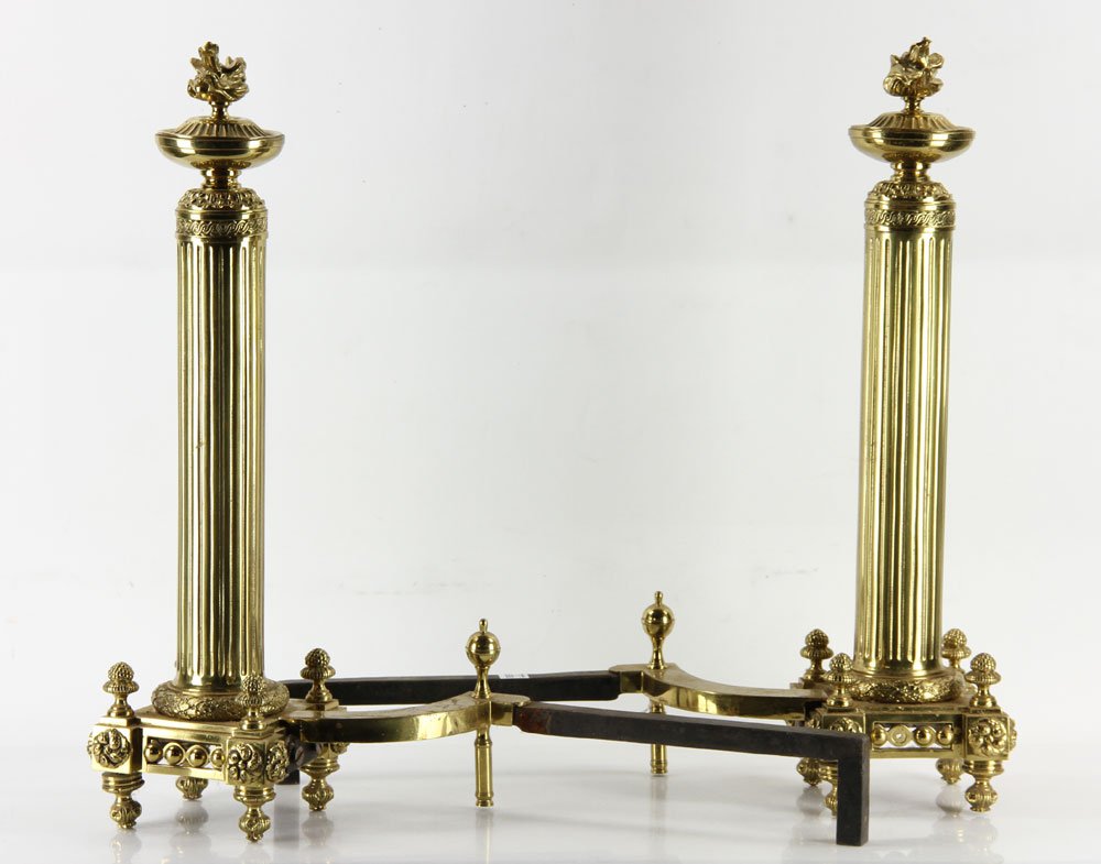 Brass Andirons: Early 20th century andirons, brass, having flame finials, 26" h. Provenance: from a Massachusetts estate.