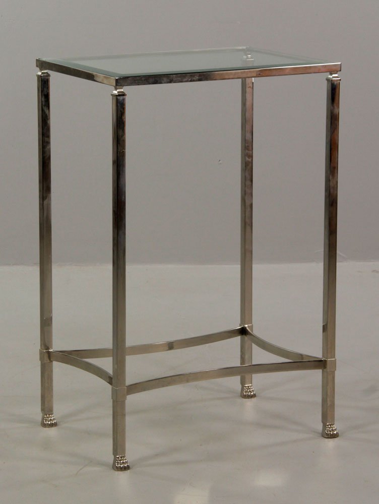 Philippe Starck Table: Philippe Starck table, stainless steel with glass top, 33 1/4" h x 22" w x 16" d. Provenance: From an Argentina estate.