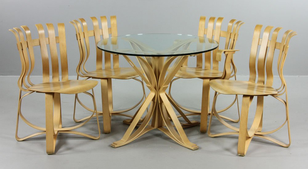 Gehry By Knoll Table and Chairs: Frank Gehry by Knoll table with four chairs, bentwood, stamped 06/19/93, table 28 1/4" h x 36" dia, chairs 33 3/4" h x 20" w x 19" d. Provenance: From a Florida estate.