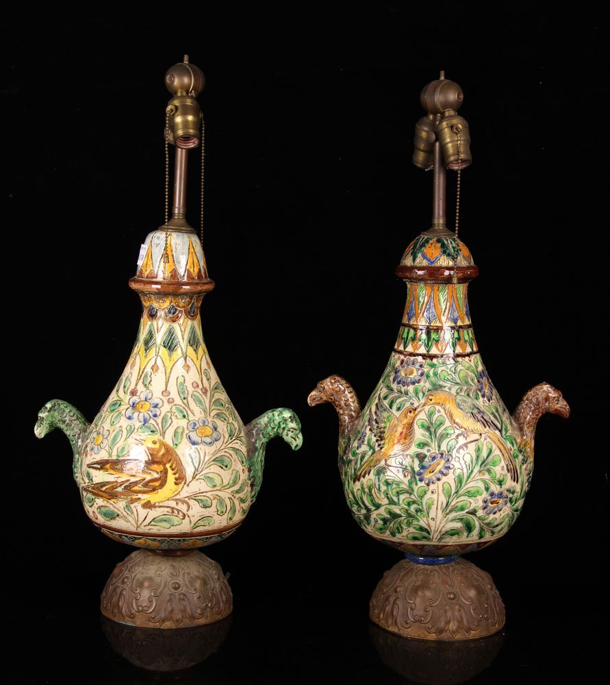 Pr. Early 20th Italian Majolica Table Lamps: Pair of early 20th century Italian Majolica glazed table lamps, with hand chased brass bases, bird and 9 flowers decoration, 28" h x 13 1/3" w. Provenance: From a Delray Beach, FL estate.