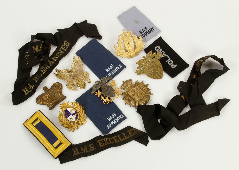 Lot of American and British Military Insignia: Lot of American and British military insignia. Provenance: From the estate of film, television and stage performer Raymond Kyle-Koscuik. Originally from New York, Kyle settled in West Hollywood, Calif