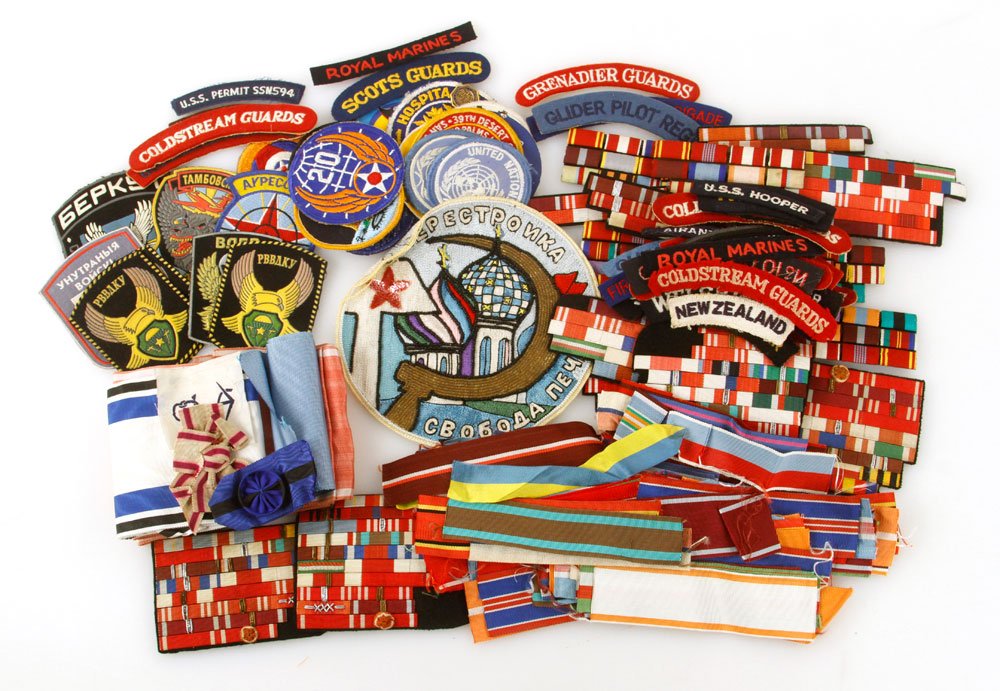 Lot of Military Patches and Ribbon Bars: Lot of military patches and ribbon bars, various countries. Provenance: From the estate of film, television and stage performer Raymond Kyle-Koscuik. Originally from New York, Kyle settled in West Hol