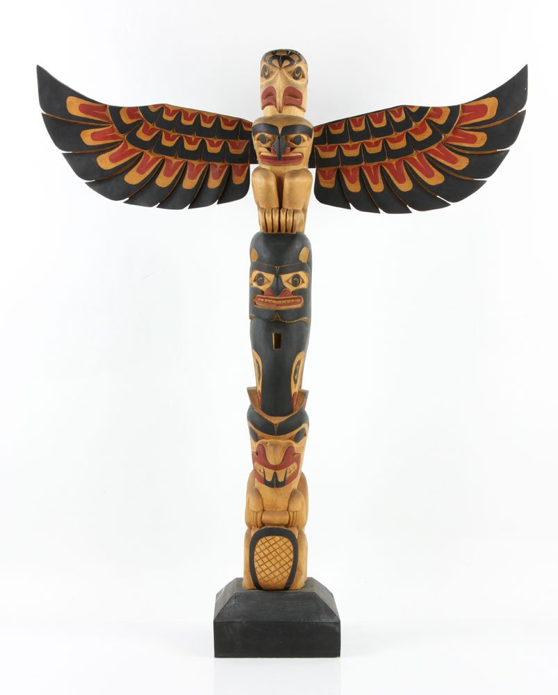 Salish Carved Polychrome Totem Pole: Pacific Northwest Salish Native American totem pole, carved and polychromed wood, signed "Aubrey Lafortune" on base, 40 1/2" high x 30" wide. Provenance: from the personal collection of Larry and Joy 