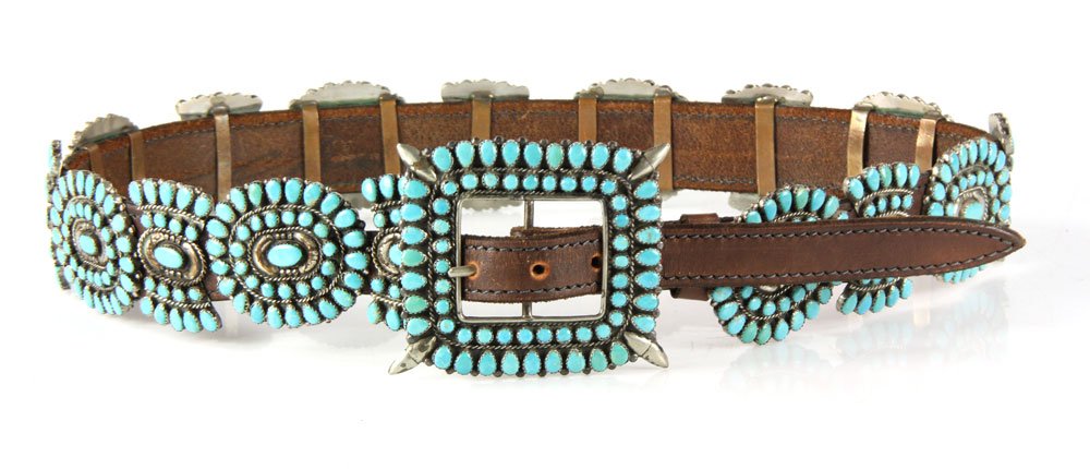 Navajo Sterling and Turquoise Belt: Navajo belt, sterling silver and turquoise, 39" long. Provenance: from the personal collection of Larry and Joy Redman of Lompoc, California.