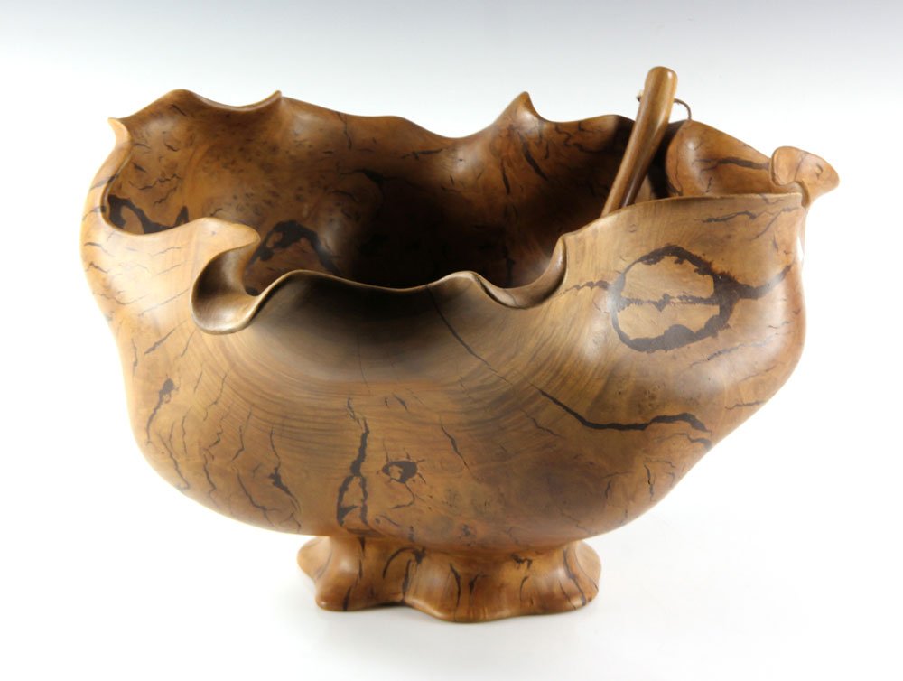 Carved Burlwood Punch Bowl and Ladle: Carved punch bowl and ladle, burlwood, signed "Sima Tadic," 10" high x 6" diameter. Provenance: from the personal collection of Larry and Joy Redman of Lompoc, California.