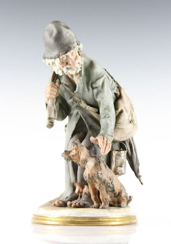 Italian Bisque Figurine: Italian figurine, bisque, signed "RC," 10 1/2" high. Provenance: from the personal collection of Larry and Joy Redman of Lompoc, California.