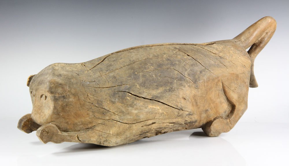 Folk Art Carved Cat: Folk Art cat, carved wood, 32" long. Gift of Billy Pearson to Jacqueline Stuart, wife of David Stuart of David Stuart Galleries in Los Angeles, California, to include signed and inscribed booklet from