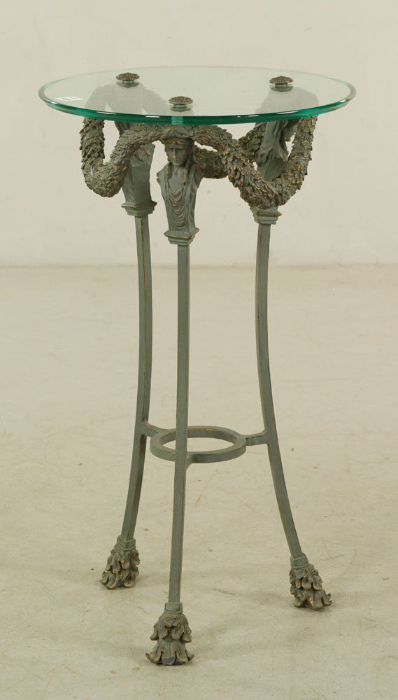 French Empire Style Bronze Tripod Table: French Empire-style tripod table, bronze with glass top, with lion paw feet and garland decoration, 28" h x 16" dia.