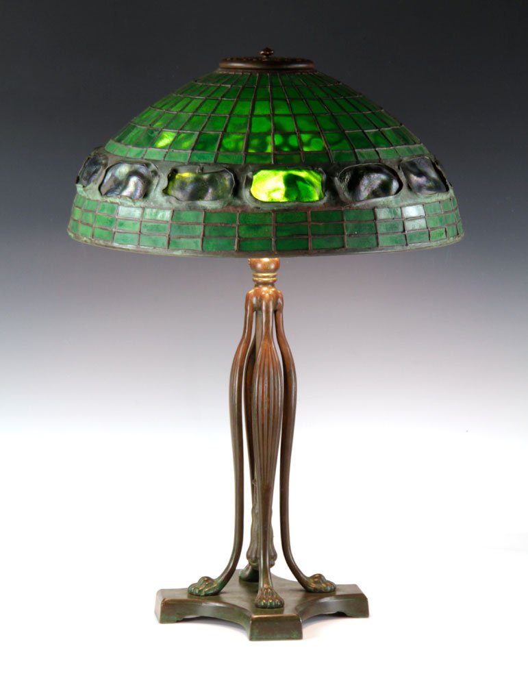 Tiffany Studios Turtleback Stained Glass Table Lamp: Turtleback table lamp, bronze base with leaded stained glass shade, signed "Tiffany Studios" on shade and base, 24" h x 16" dia.
