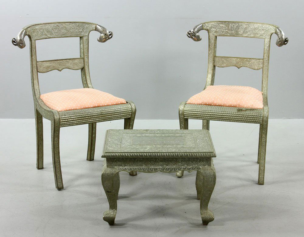 Ram's Head Table and Chairs: Table and chairs, with ram's head embellishment.