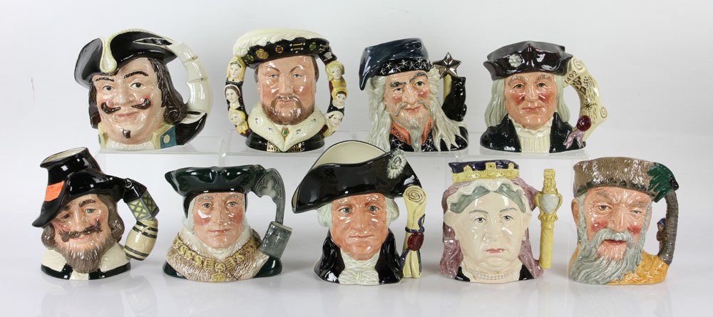 9 Royal Doulton Large Character Jugs: Lot of nine Royal Doulton large character jugs, to include: limited edition double-handled Henry VIII D6888, Sir Thomas More D6792, Guy Fawkes D6861, Queen Victoria D6816, Robinson Crusoe D6532, Chris