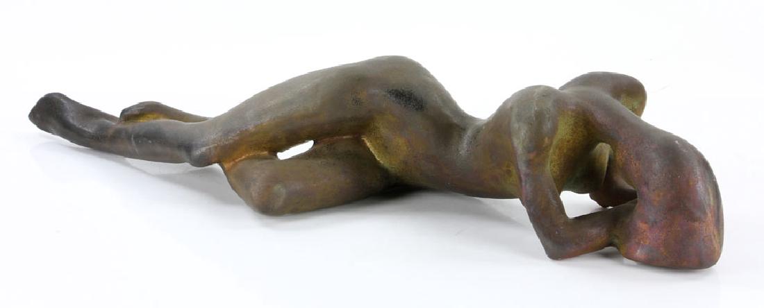 Tudzarov, Reclining Female Nude, Clay: George Tudzarov (American, 1944-2000), reclining female nude, fired clay with iridescent finish, 25" l. Provenance: from the estate of a prominent Massachusetts surgeon.