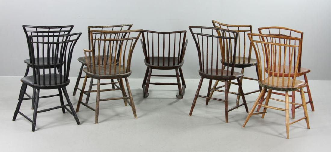 Set of Nine Birdcage Windsor Chairs: Assembled set of nine birdcage Windsor chairs, American in origin, consisting of seven sidechairs, one armchair and one rocker, circa 1800. Provenance: from a Lexington, Massachusetts estate.