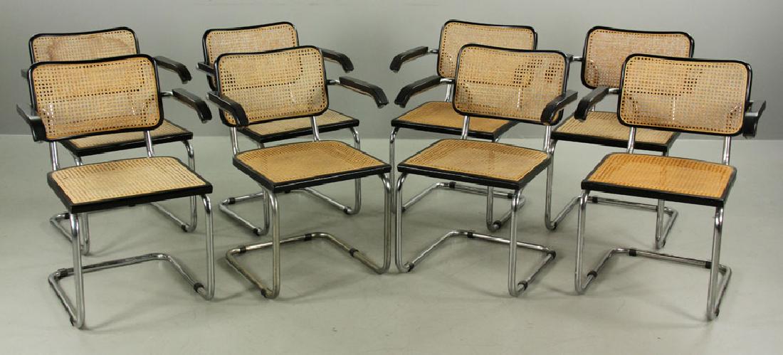 Set of Eight Breuer Cesca Chairs: Set of eight Marcel Breuer Cesca chairs, wicker and enameled wood, also known as the B64 chair, made in Italy, 32" high x 23" wide x 23" deep. Provenance: from a Los Angeles, California estate.