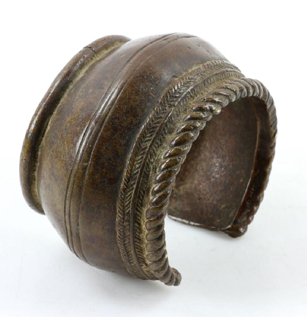 East African Anklet: East African ankle bracelet, circa 1850, 2 3/4" high x 4" wide x 3 1/2" deep. Provenance: from the lifetime collection of Cheryl Burke of Sarasota, Florida.