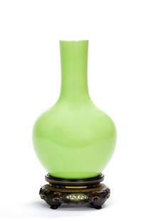 Very Rare Chinese Lime Green Vase: Very rare Chinese "lime green" vase, globular form elegantly rising to a tall, slightly flared, columnar neck, applied overall with a lustrous enamel of bright lime-green hue, interior and base applie