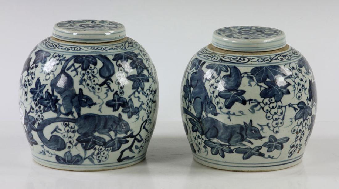 Pr. Blue and White Ginger Jars: Pair of blue and white ginger jars, hand-painted with squirrel motif, with original lids, circa 1880s, 8 1/2" h x 8 1/2" dia. Provenance: From the lifetime collection of Cheryl Burke of Sarasota, Flor
