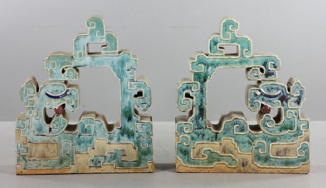 Pr. Chinese Dragon Roof Tiles: Pair of Chinese decorated roof tiles, with dragon motif, circa 1920s, 37" l x 33" w x 9" d. Provenance: From the lifetime collection of Cheryl Burke of Sarasota, Florida.