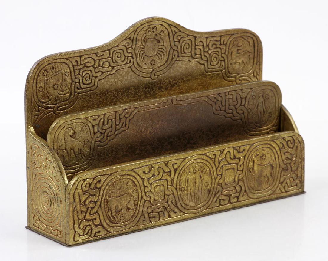 Tiffany Studios Bronze Letter Holder: Tiffany Studios New York bronze letter holder, embellished with the signs of the zodiac, 6 1/4" h x 9 1/2" w. Provenance: From a Santa Barbara, California estate.