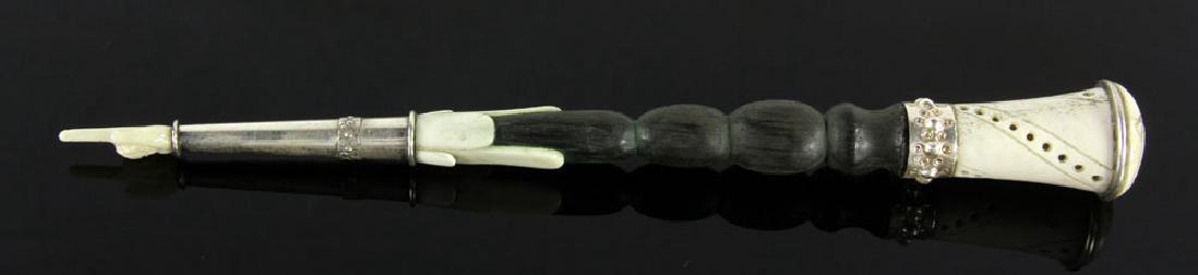Russian Silver Torah Pointer: Russian Torah pointer or yad, ebony and bone with silver accents, 10" l. Provenance: From a Hartford, Connecticut collection.