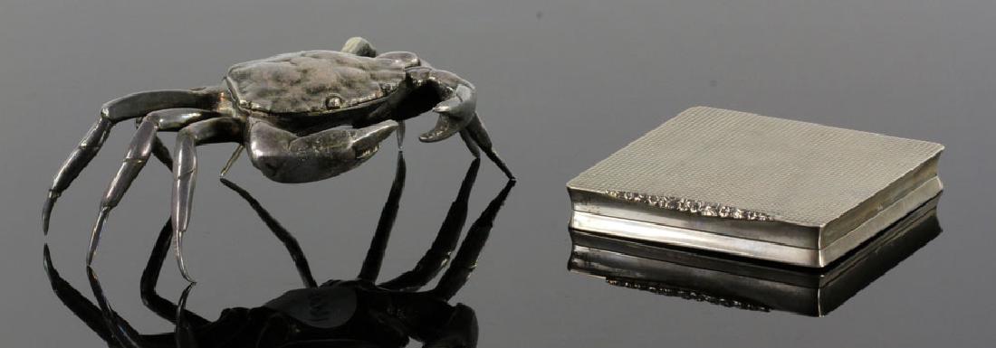 Lot of 2 Silver Compacts: Compact with mirror, .830 silver, approximately 4.9 troy oz TW (including mirror, etc.); with French silver-plate figural crab compact, 5" l x 4" w. Provenance: From a Santa Barbara, California estate