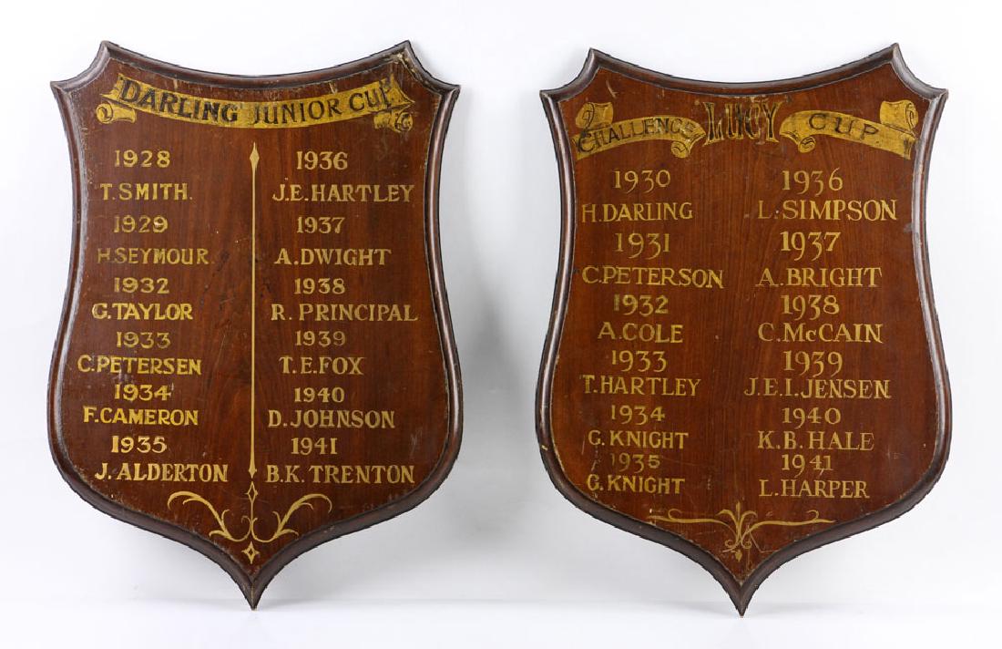 Pr. English Mahogany Trophy Plaques: Pair of English mahogany trophy plaques, circa 1928, including "Lucy Challenge Cup" and "Darling Jr. Cup," 22" h x 16" w x 1" d. Provenance: From the lifetime collection of Cheryl Burke of Sarasota, F