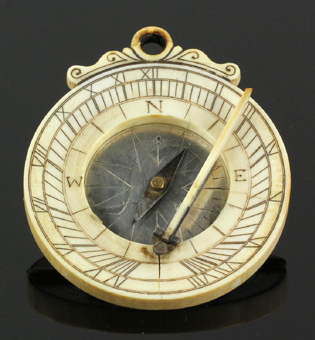 Carved Bone and Silver Astrolabe and Compass: Sailor's astrolabe and compass, carved bone and silver, 3" dia. Provenance: From a California estate.