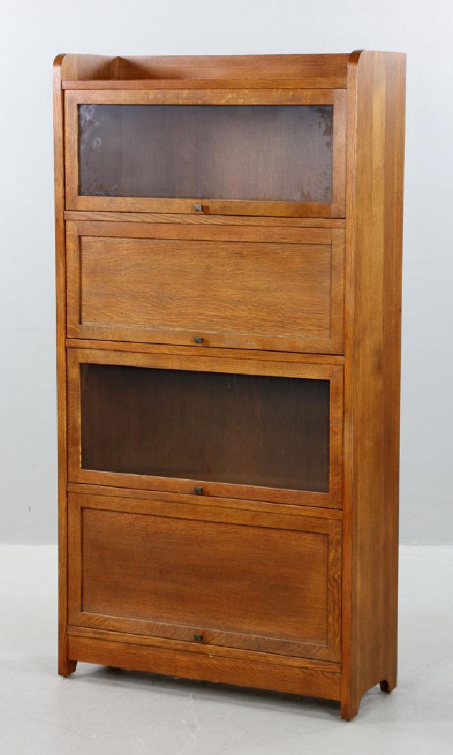 Stickley Oak Bookcase: Stickley bookcase, oak, branded and labeled "Stickley," 64" h x 33" w x 12" d.