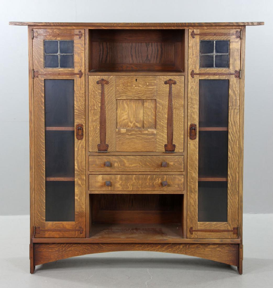 Mission Oak Secretary: Mission secretary, oak with wrought copper hardware, Harvey Ellis design, branded "Warren Hile Studio," 59 1/2" h x 58 1/2" w x 17" d.