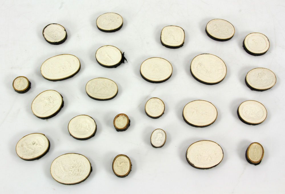 Lot of Plaster Medallions: Lot of plaster medallions, twenty-four total.