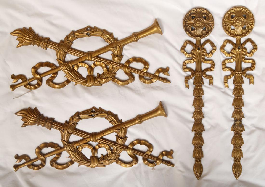 Four Brass Wall Mounts: Four wall mounts, brass, 16" long (largest). Provenance: from a South Ocean Blvd, Palm Beach estate.