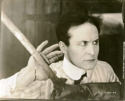 EXTREMELY RARE STILL FROM THE GRIM GAME: Stopping blow from a sword held by a gloved enemy! Number L 302-42