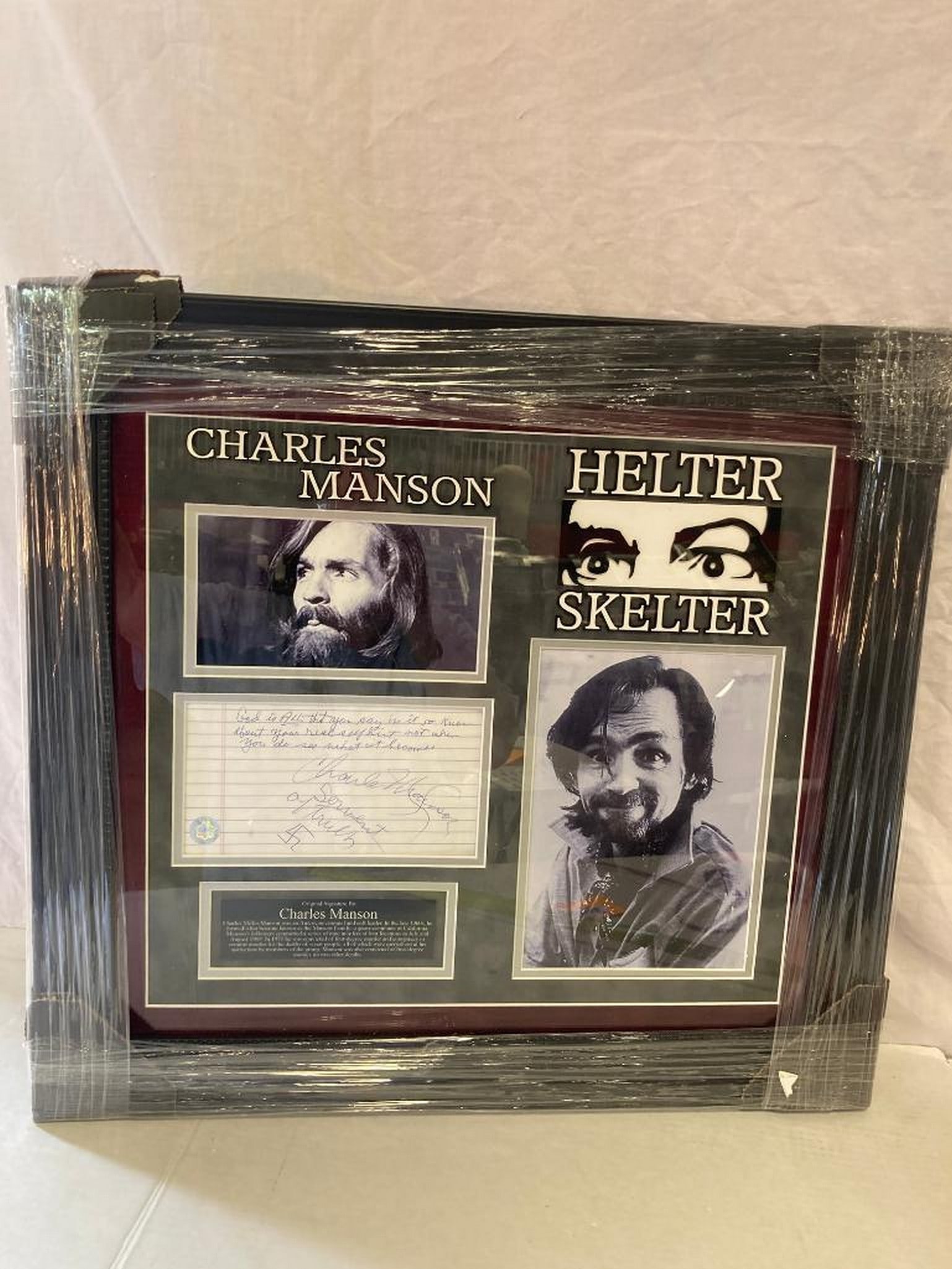 Charles Manson Signed Note/Swastika Photo Frame (1 of 3)