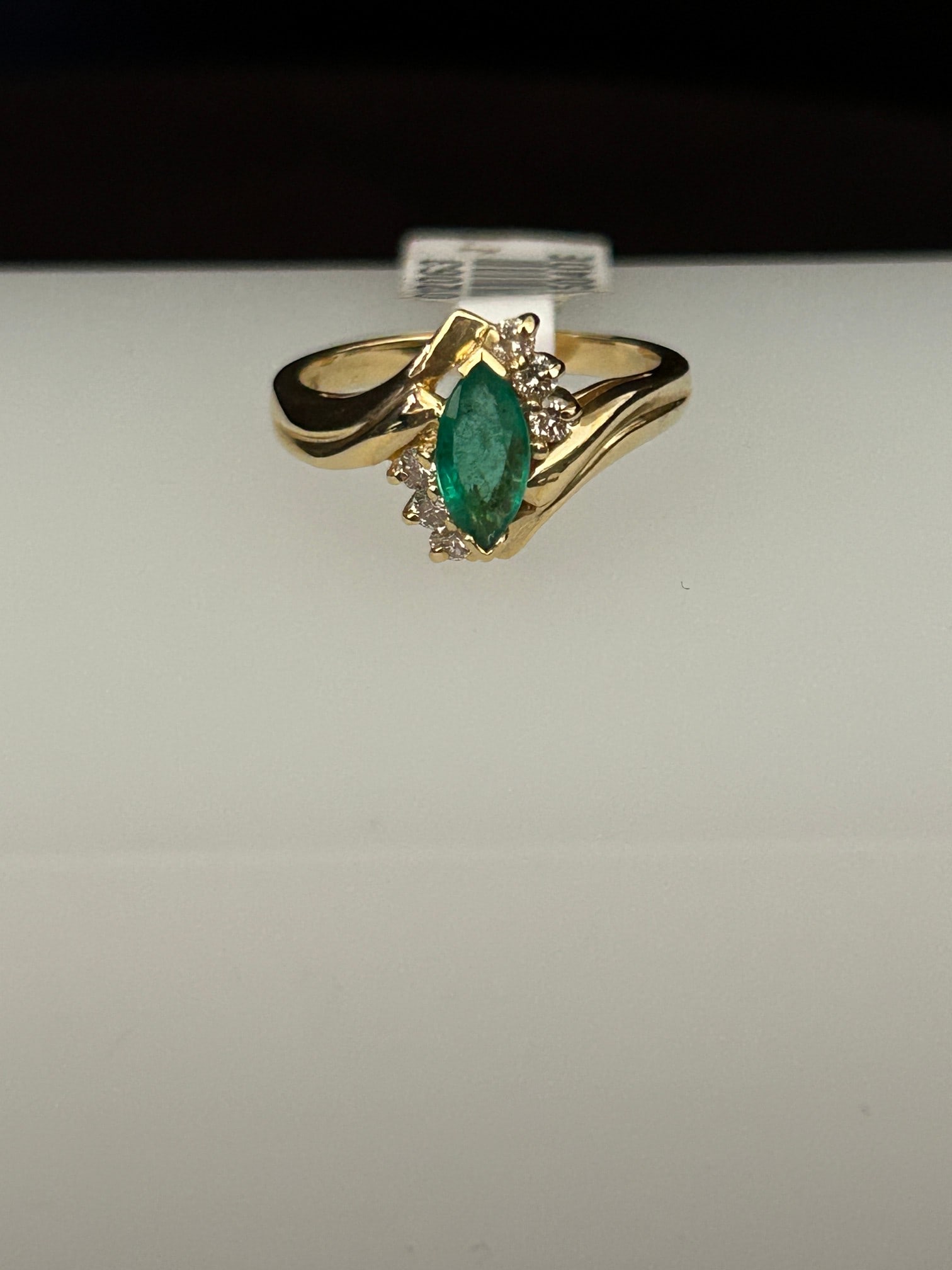 14 KYG Marquis Cut Emerald and Diamond Ring: 14 KYG Marquis Cut Emerald and Diamond Ring 6 round diamonds 0.20ct Size 6.5 4.2 grams