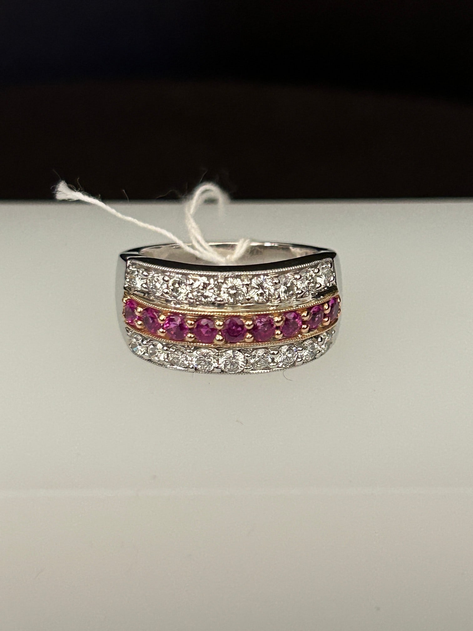 14KWG Pink Sapphire and Diamond Ring: 14KWG Pink Sapphire and Diamond Ring 9 Sapphires 18 Round Diamonds Size 7 12.1 grams