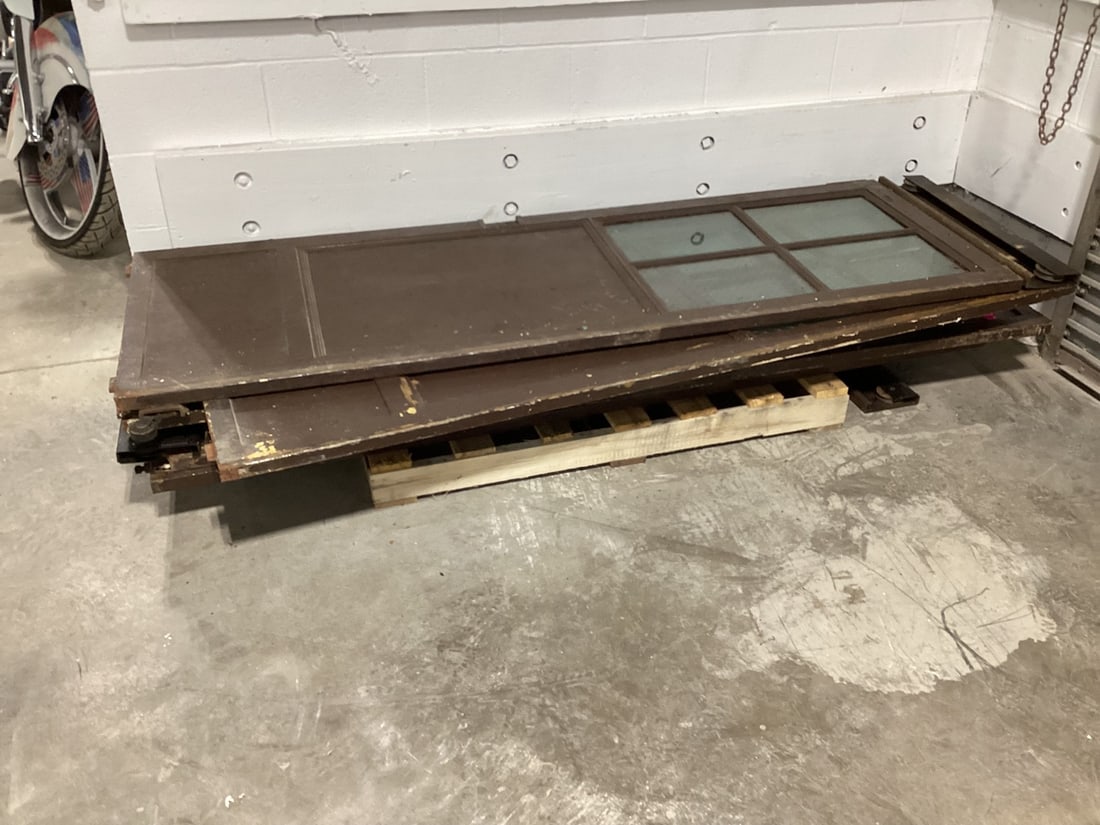 6 Metal sliding doors with glass: 84x28x1.5 Each; very heavy